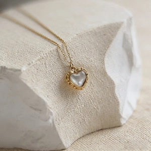 Vintage gold-plated heart pendant necklace with shell inlay on white stone