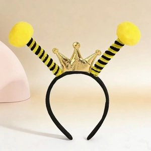 Bee headband for kids with gold crown and yellow pom-pom antennae for costume parties