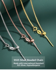 Detailed macro view of S925 sterling silver bead chains with needles and hallmarks