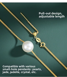 Detail of S925 sterling silver gold necklace with adjustable pull-out clasp and round pearl