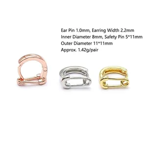 Detailed view of 18K gold plated safety pin earrings with precise size and weight measurements
