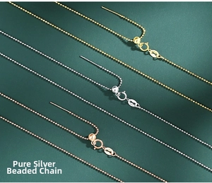 Detailed view of S925 sterling silver bead chains in gold, silver and rose gold finishes