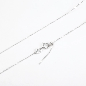 Macro shot of S925 sterling silver chain with adjustable slide bead and needle pin