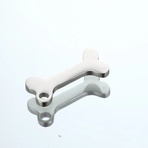 Polished stainless steel bone-shaped pendant tag with hole for jewelry making