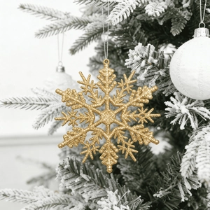 Glittering gold snowflake ornament for Christmas tree and wreath decoration