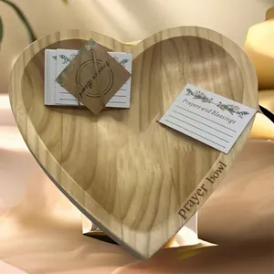 Handcrafted heart-shaped wooden prayer bowl with natural grain and prayer cards