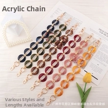 Close-up of colorful acrylic replacement bag chains with gold metal lobster clasps