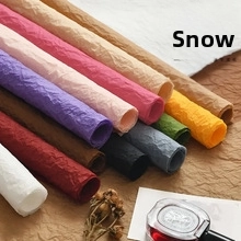 Close-up of assorted colorful crinkled texture paper for luxury gift flower packaging