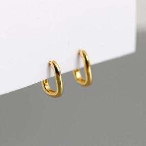Orecchini a cerchio ovali a forma di U in oro lucido in stile minimalista francese
