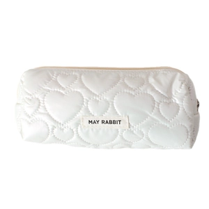 White heart-quilted pencil case with zipper and MAY RABBIT label on a white background