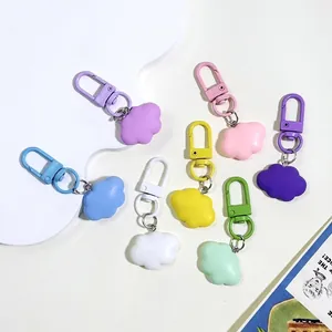 Set of colorful resin cloud keychains in vibrant candy colors with matching metal clasps