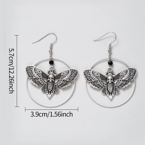 Gothic silver moth earrings with skull center and black bead dangles for women