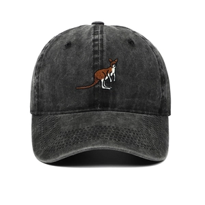 Detailed close-up of kangaroo embroidery on a vintage washed grey cotton baseball cap