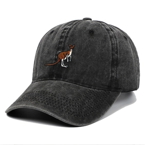 Macro side view of a grey washed denim baseball cap with kangaroo embroidery