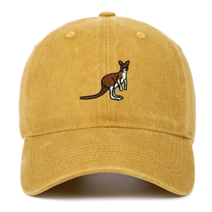 Detailed view of mustard yellow washed cotton baseball cap with kangaroo embroidery