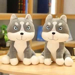 Pair of 40cm plush husky dolls with blue eyes in a cozy home setting for gifting
