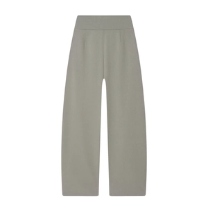 Detailed view of high waisted wide leg trousers with pleated grey-green drape fabric