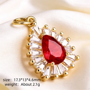 Elegant gold pear-shaped red crystal pendant with halo diamonds on white silk fabric