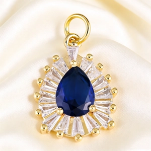 Deep blue teardrop crystal pendant with zircon halo on gold plated jewelry base
