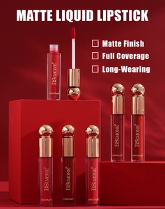 Matte liquid lipstick bottles with golden spherical caps displayed on red pedestals