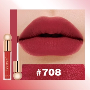 Detailed swatch of matte velvet liquid lipstick #708 on lips with applicator brush
