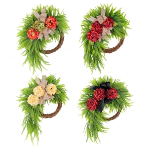 Pastel hydrangea door swags with lush greenery and rustic bows on woven rattan bases