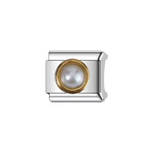Detailed close-up of a stainless steel modular charm with a white pearl and gold rim