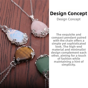 Close-up of teardrop gemstone necklaces with intricate silver floral filigree detail