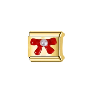 Close-up of golden Italian modular link with red bow and pearl detail for DIY bracelet