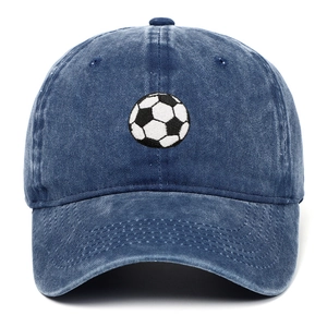 Close-up of football embroidery on navy blue washed cotton sports baseball cap