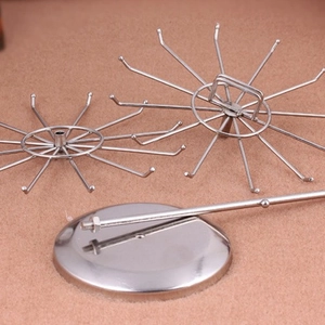 Rotating double-tier vintage iron jewelry stand with hooks and round base for necklaces