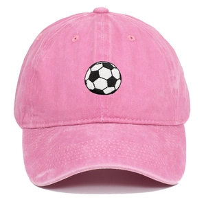 Close-up of football embroidery on pink washed cotton baseball cap with fine stitching