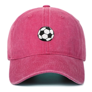 Close-up of fine embroidery detail showing a black and white soccer ball on a cotton cap