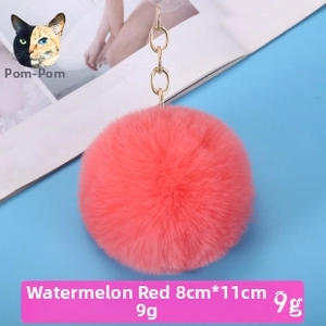 Detail view of 8cm faux rabbit fur keychain in watermelon red with golden clasp