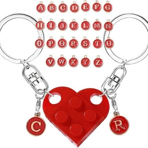 Macro detail of red heart brick keychain set with full 26-letter alphabet pendants