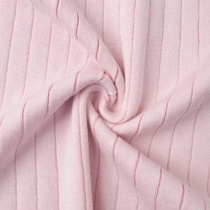 Detailed view of light pink ribbed knit fabric showing soft texture and high elasticity