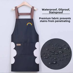 Close-up showing the waterproof and oil-proof fabric with rainbow embroidery and cloud pockets