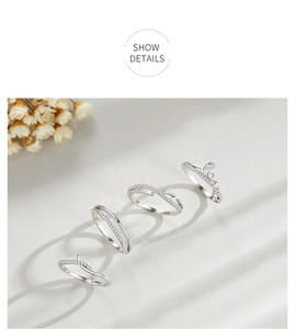 Detailed view of four S925 sterling silver minimalist rings with cubic zirconia inlay