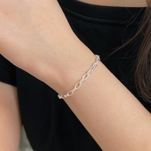 S925 sterling silver minimalist geometric irregular chain bracelet on model's wrist