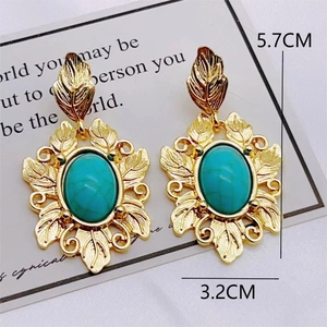 Retro Bohemian gold leaf earrings with turquoise stones measuring 5.7cm by 3.2cm