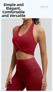 Detail of red halter neck sports bra with twist front design and high waist leggings