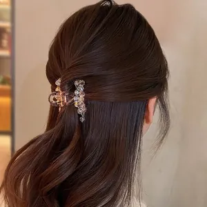Champagne gold crystal hair claw clip with colorful macaron beads on wavy hair