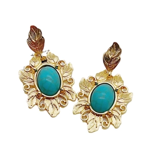 Vintage gold ornate leaf earrings with turquoise oval stones in baroque palace style