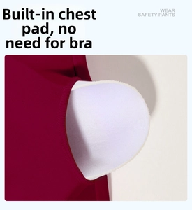 Detail of built-in white chest pads and high-stretch fabric for bra-free yoga vest