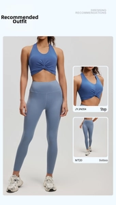 Matching set of halter sports bra and high-waist seamless yoga leggings in blue