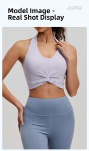Detail view of lavender twist front halter sports bra and high-waisted blue leggings