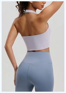 Detailed back view of light purple halter yoga tank top and blue high waist gym leggings