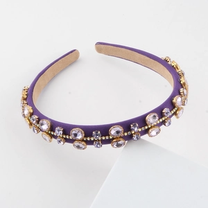 Baroque style purple fabric headband with sparkling rhinestones and gold metal settings