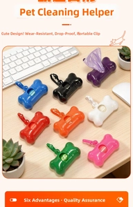 Multi-color bone-shaped pet waste bag dispensers with hooks on a light wooden background