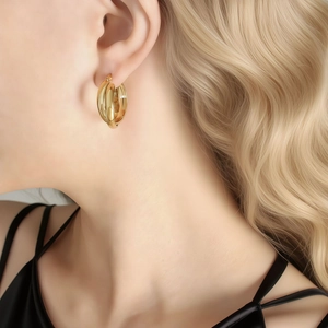 Elegant gold-tone triple-intertwined hoop earrings for women in a luxury minimalist style